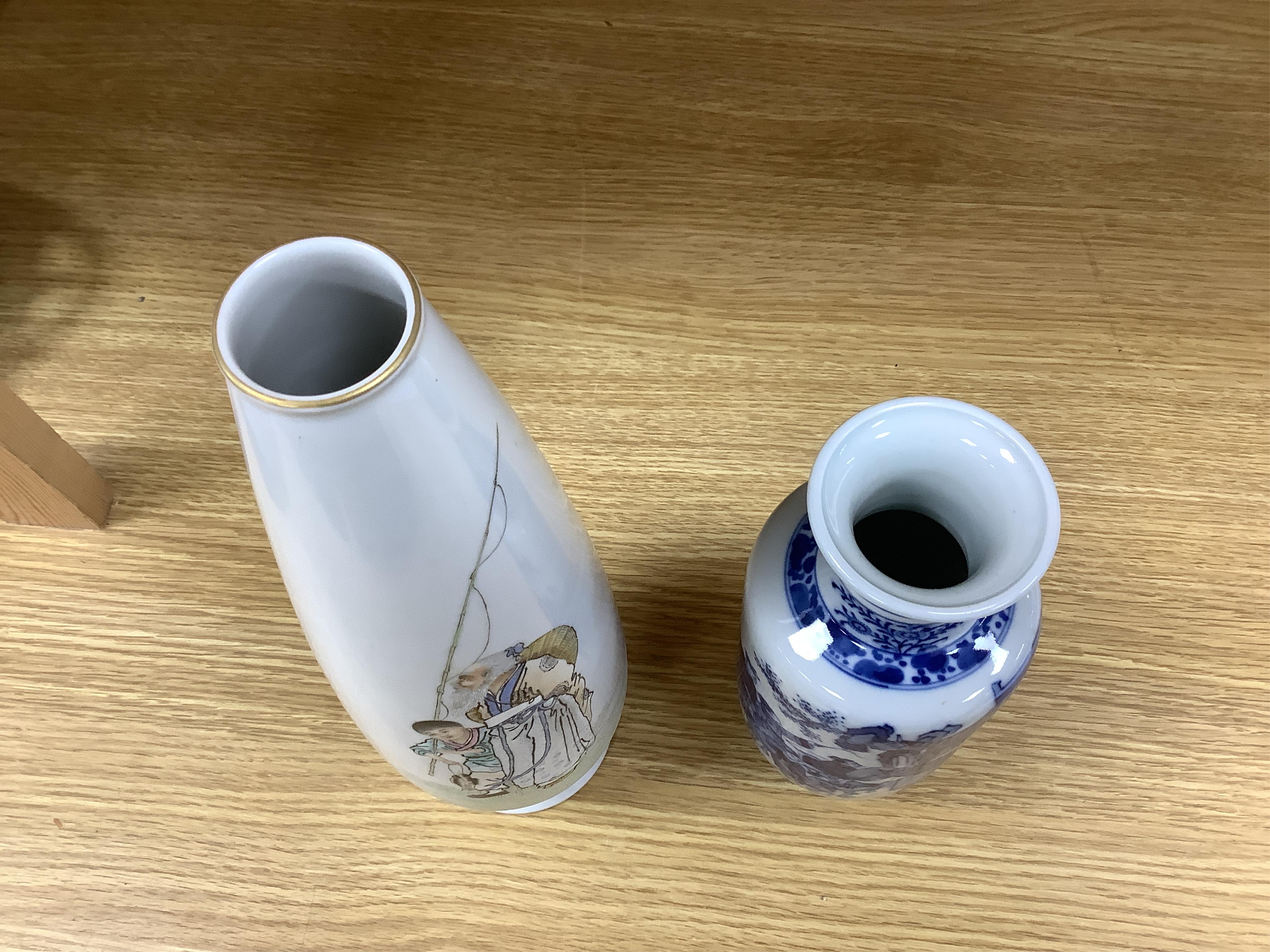 A Chinese blue and white vase and an enamelled figurative porcelain example, tallest enamel vase 29cm high. Condition - good